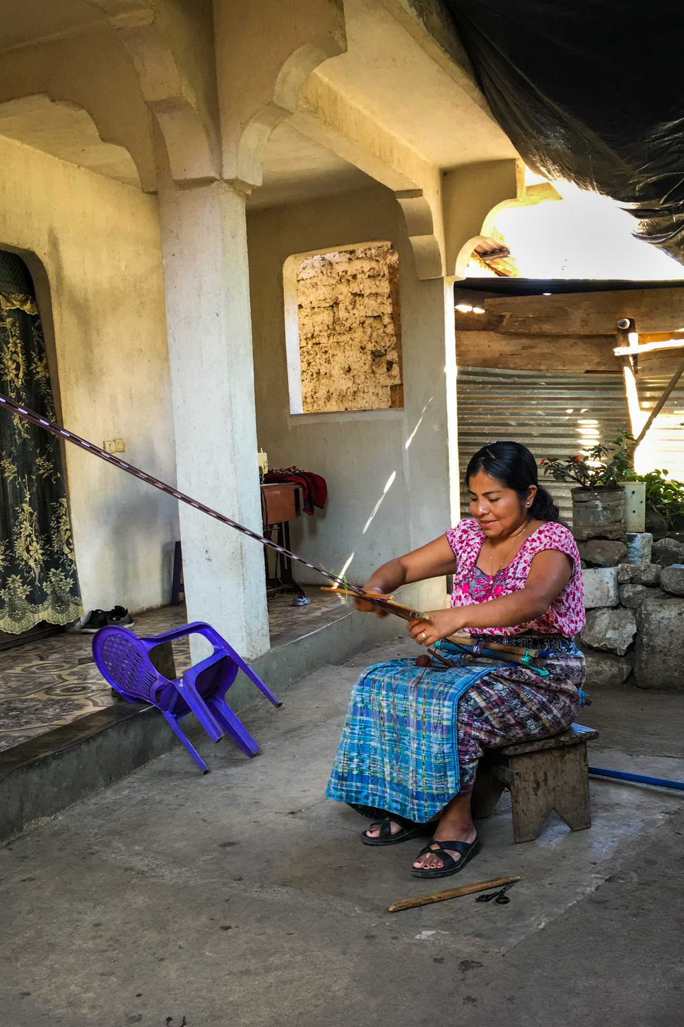 Chusita at work on the belt-loom