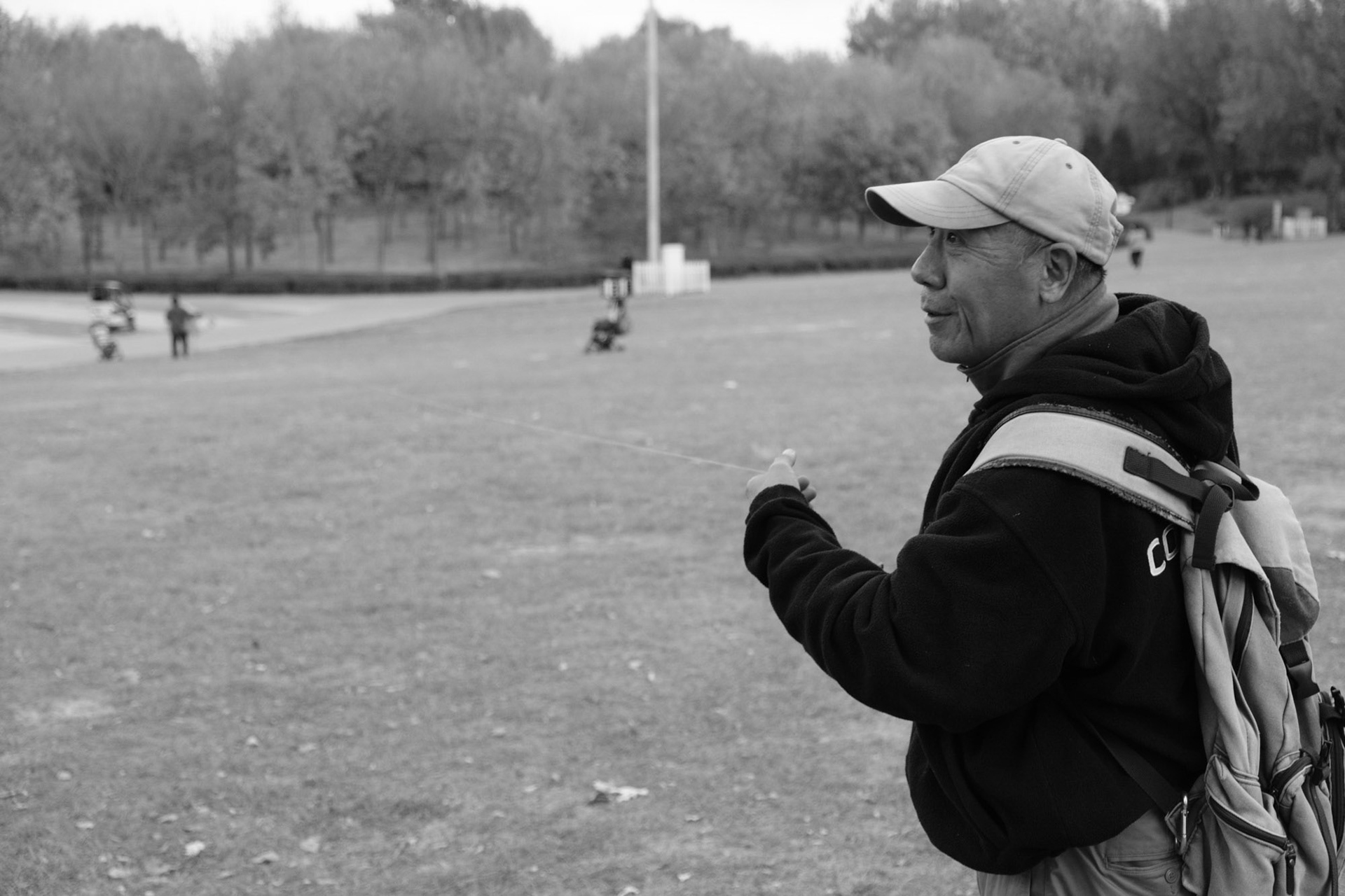 Kite flyer, Chaoyang Park, Beijing