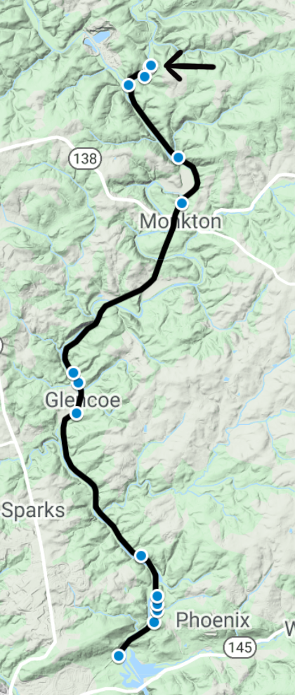 Smaller version of the overview map showing the locations of the sites along the trail. An arrow points to the northernmost site at the north end of the trail.