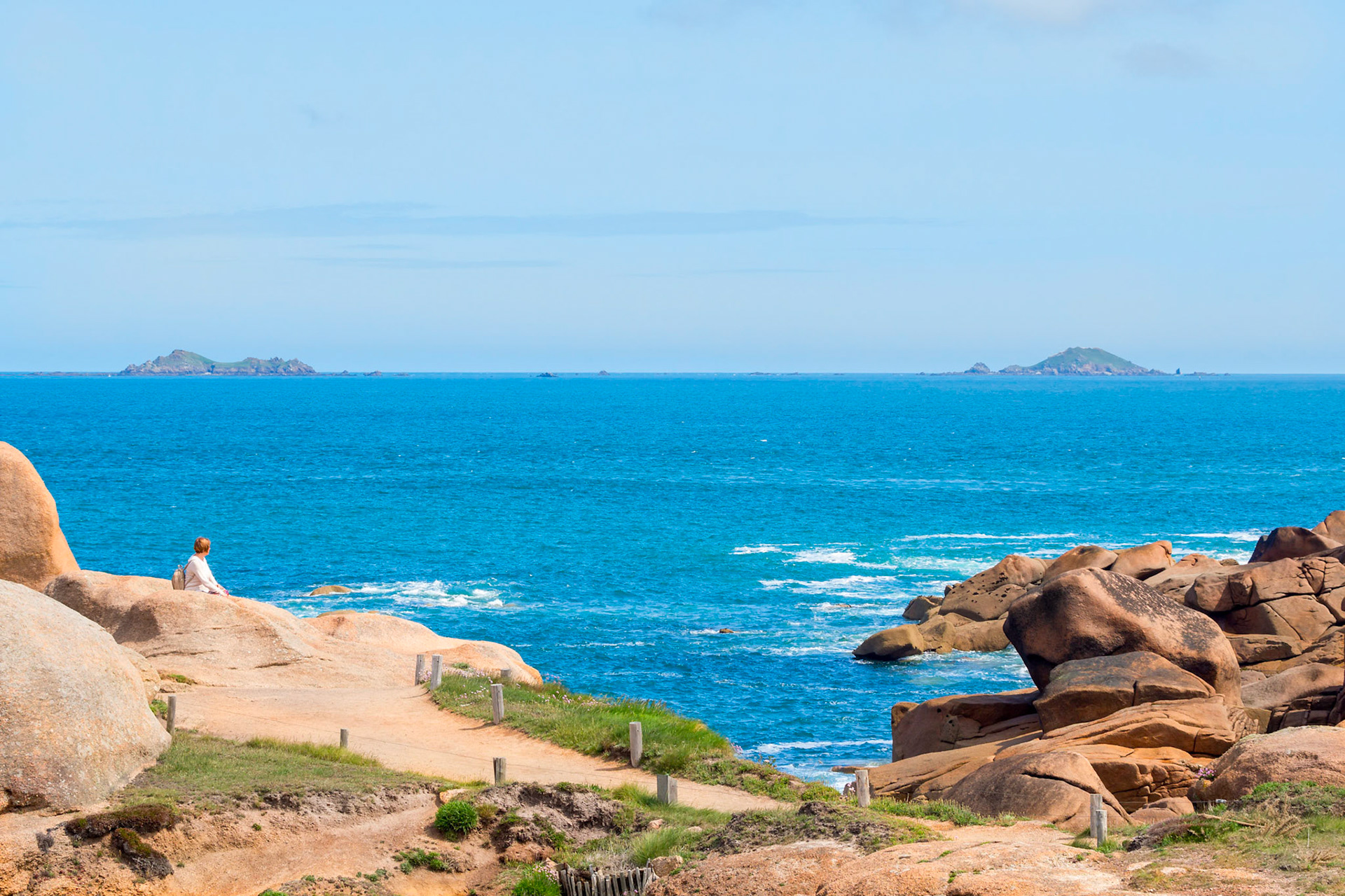 One never gets enough of the peaceful landscape on the pink granite coast in the "Seven Islands" region of Brittany, France. The rough coastline, the sea, the view of those islands....