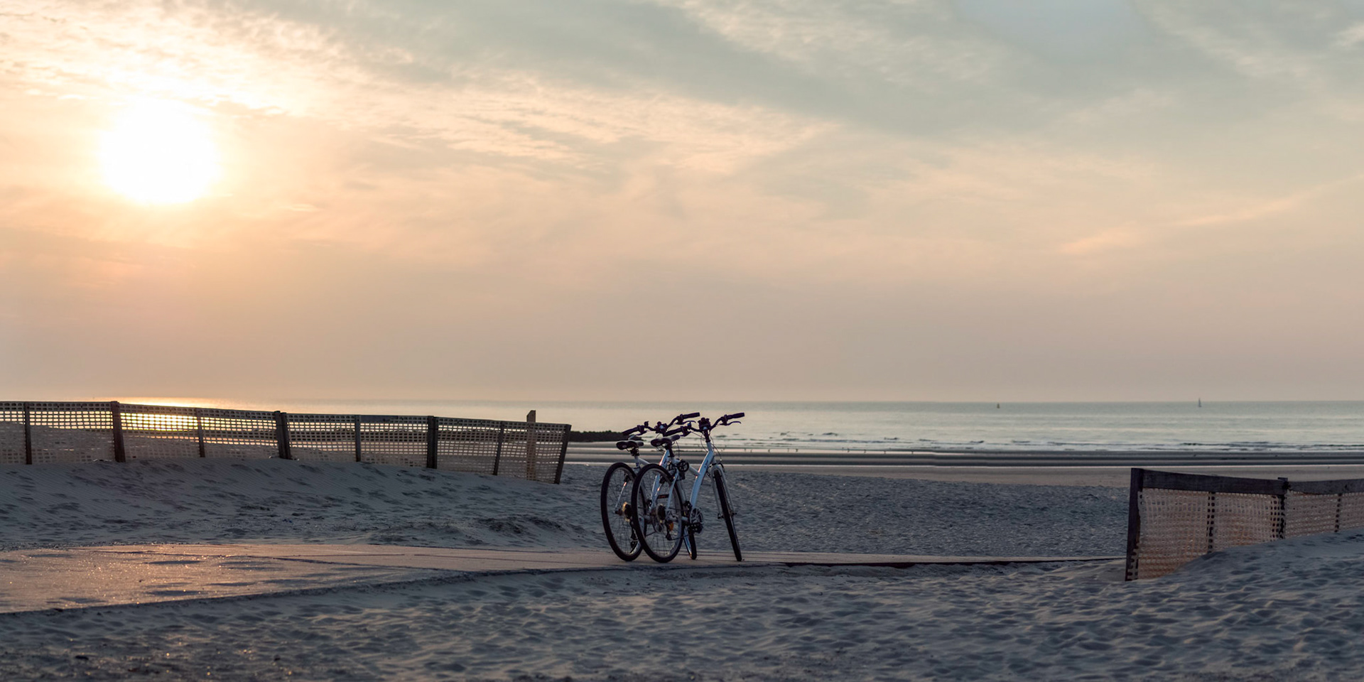 Two bikes on the beach