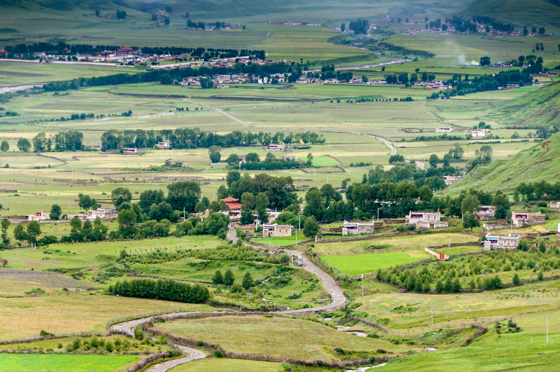 China, Eastern Tibet or Western Sichuan, also g as Kham, the landscape approaching Bamei village amongst the Tagong grasslands