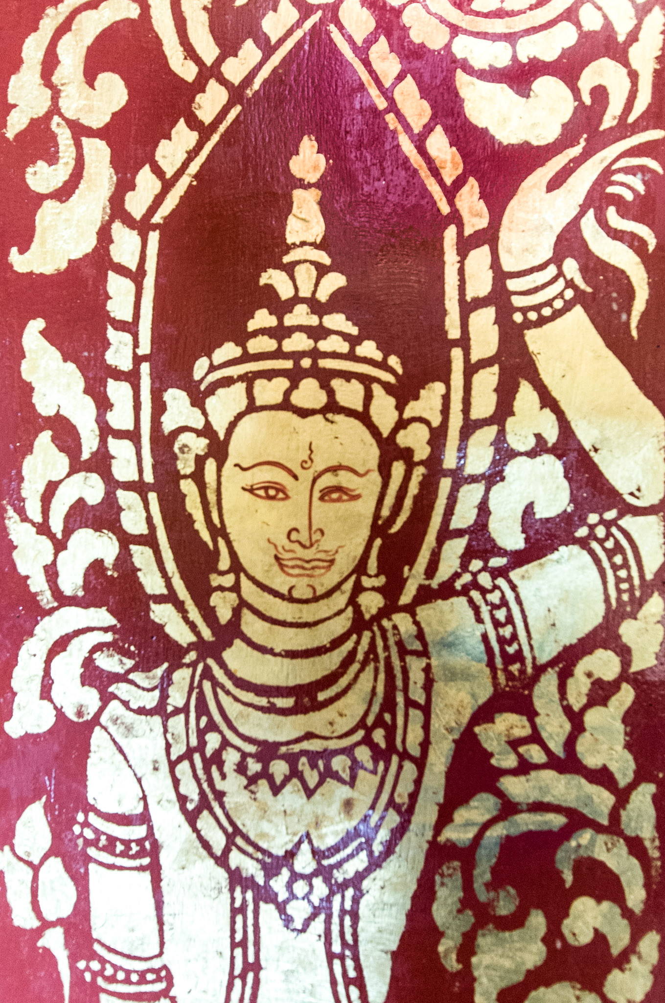 Laos, Luang Prabang, Wat Visoun, detail of temple mural painting of dancer