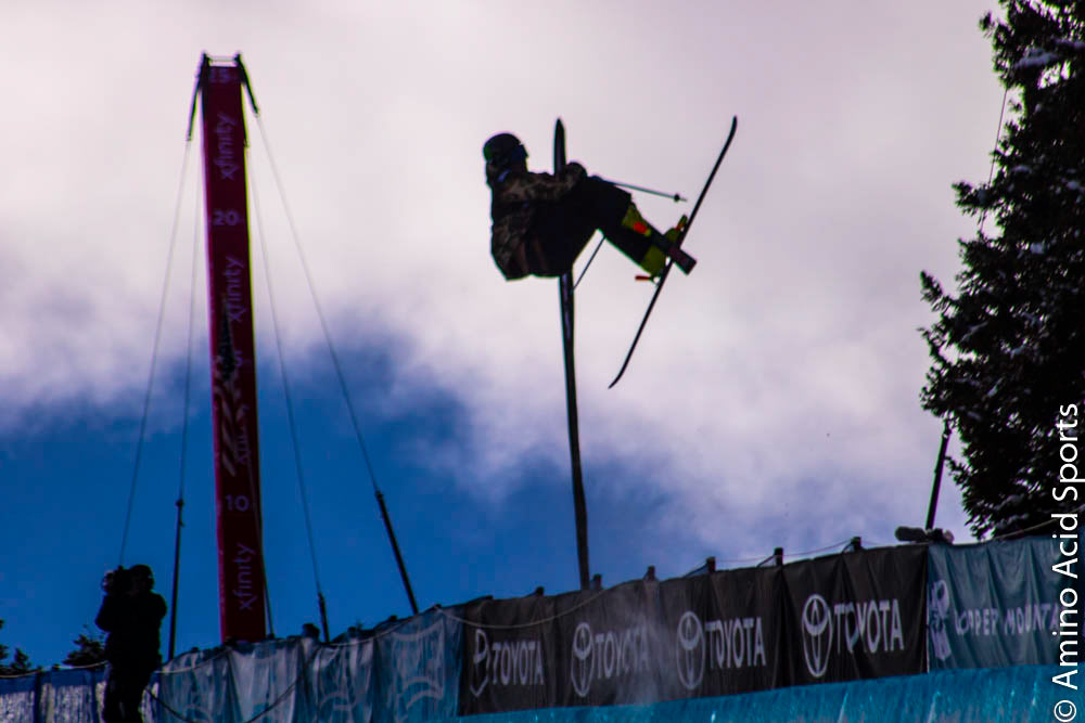 On his 1st Run, Tahoe's David Wise corks his 900* heli mute grab.