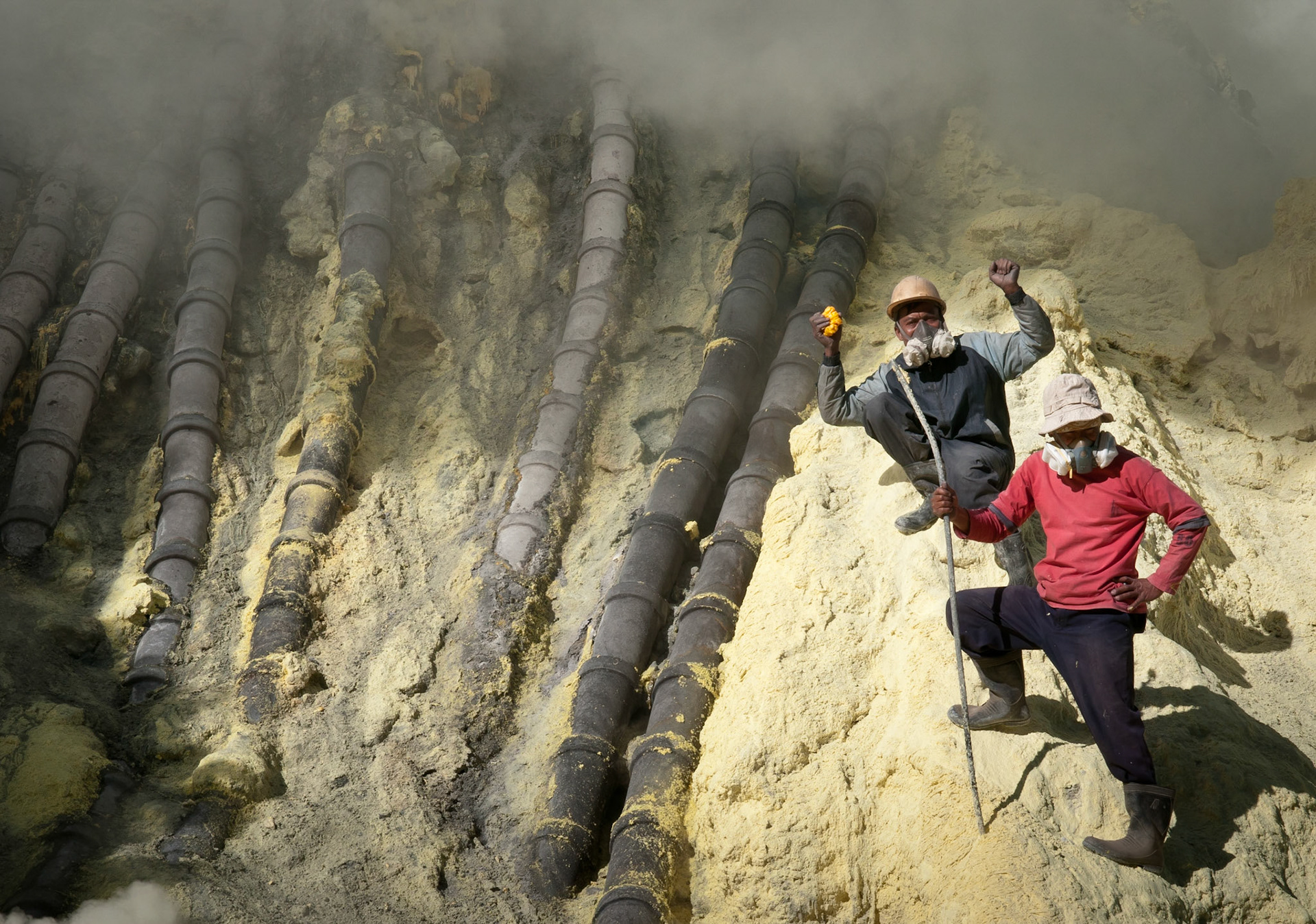 Workers at the mine (Kawah Ijen, Java, Indonesia)