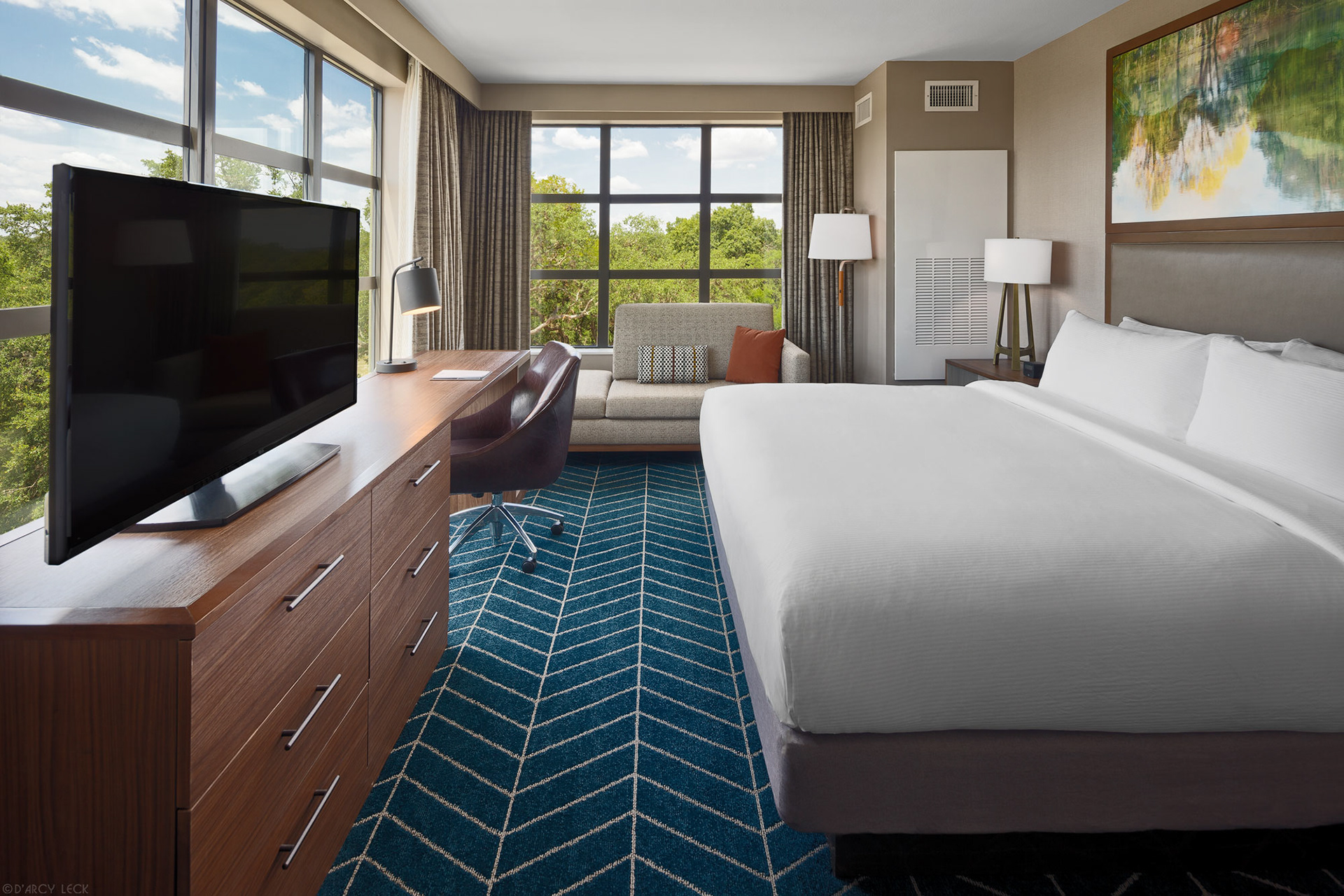 Hotel photographer D'Arcy Leck photographs a guest room at The Bevy Hotel for DoubleTree by Hilton hotels