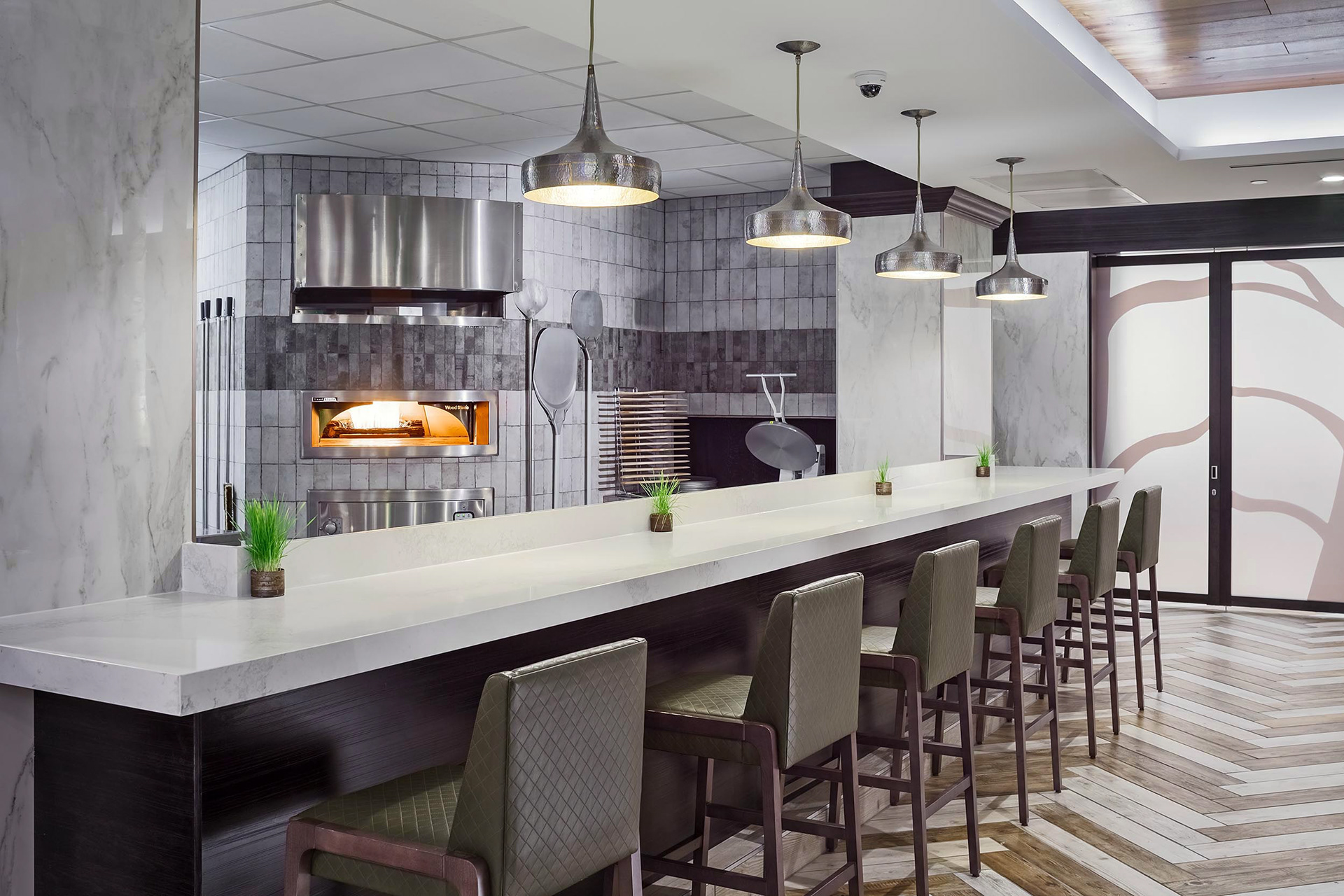 The pizza bar at the Knife & Board restaurant of the DoubleTree Denver hotel